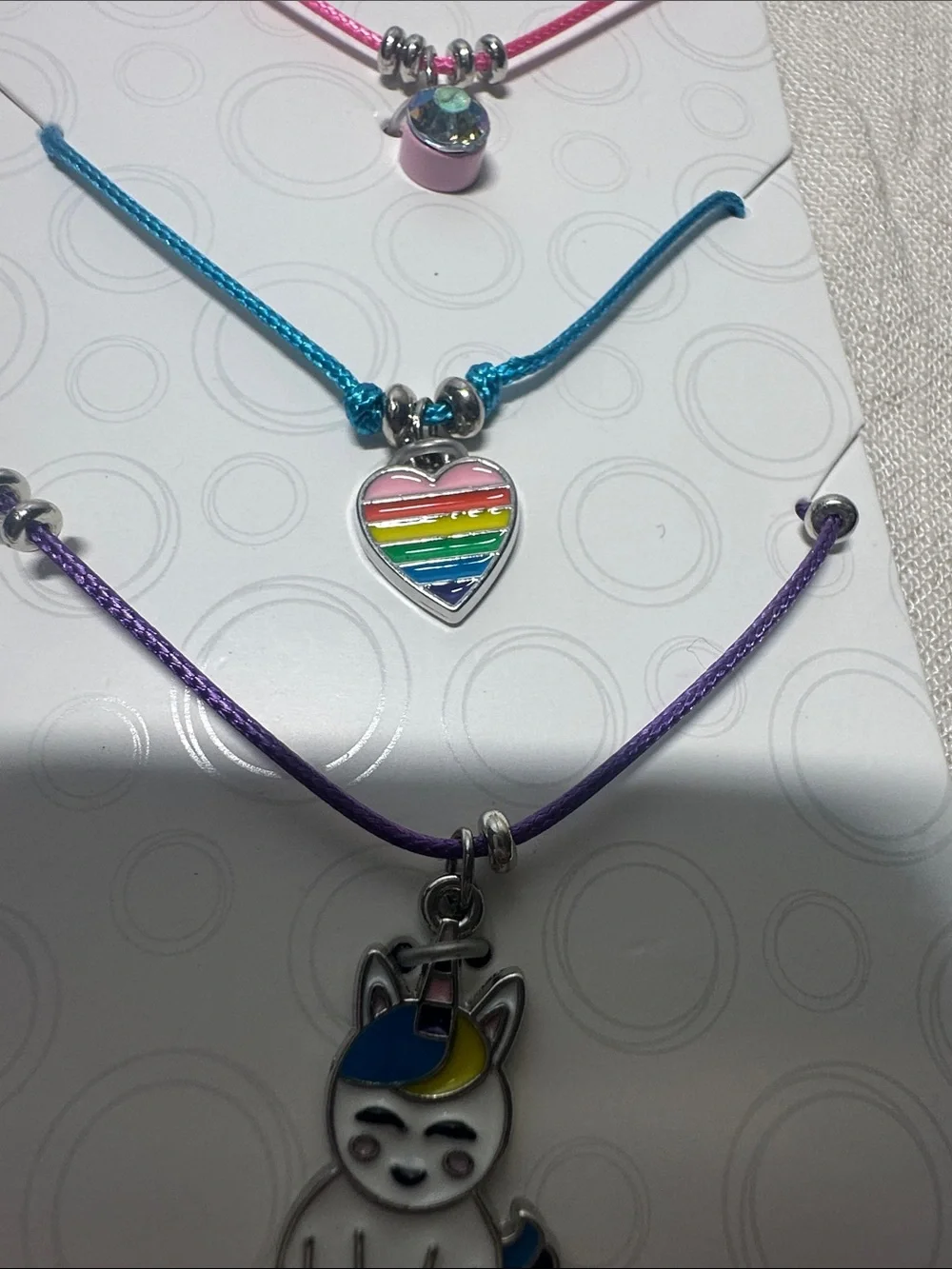 Claire's Teal & Purple Nail and Rainbow Charm Necklace Trio NWT